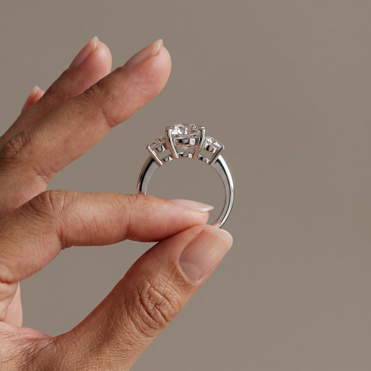 White Metal Round Moissanite Three Stone Engagement Ring