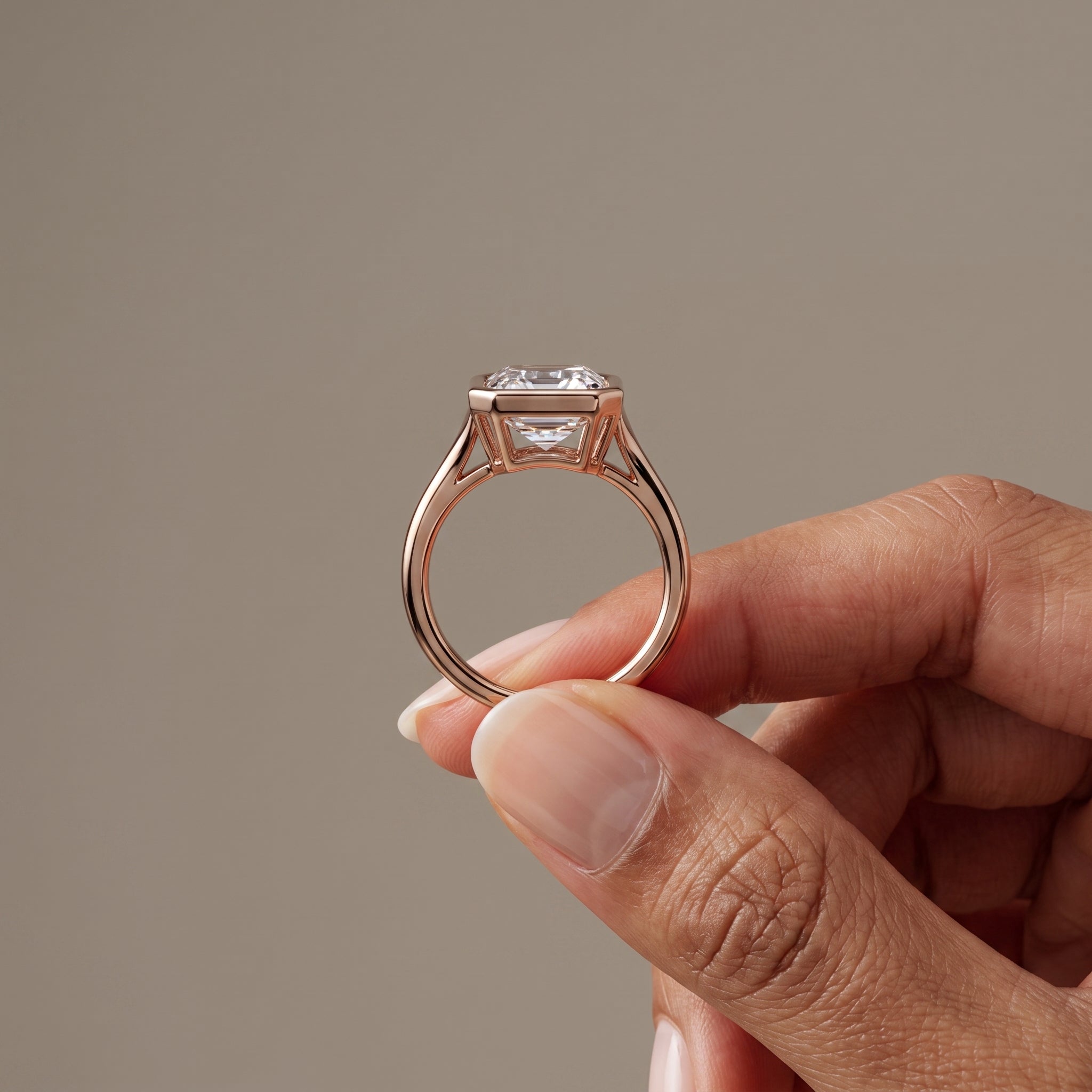 Rose Gold Emerald Cut Moissanite Bezel Engagement Ring