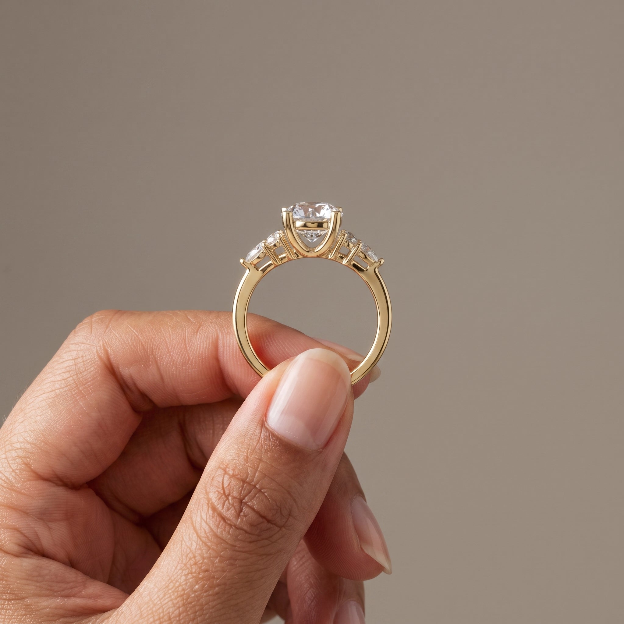 Yellow Gold Round Moissanite Engagement Ring with Side Stones