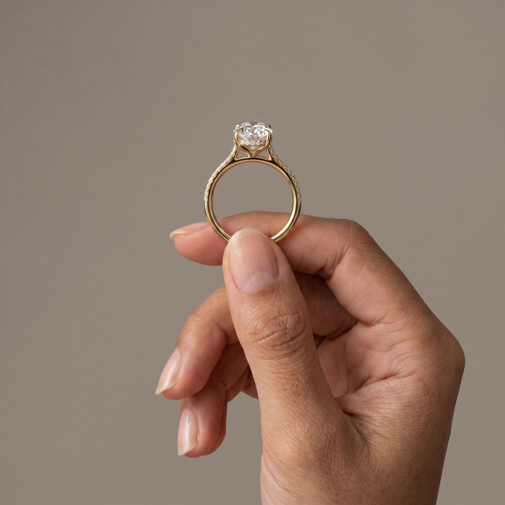 Yellow Gold Oval Moissanite Engagement Ring with Pavé Band