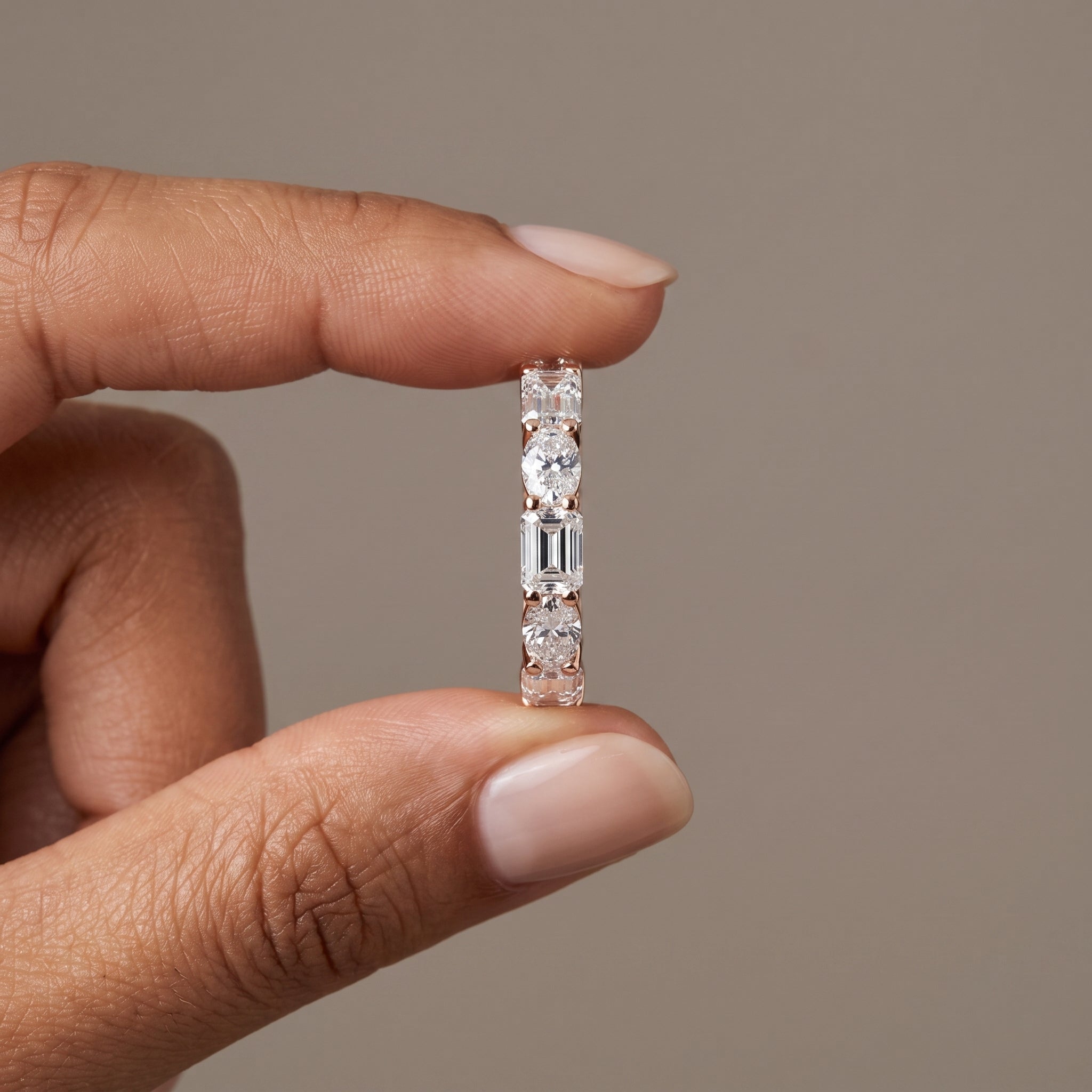 Rose Gold Alternating Oval & Emerald Cut Moissanite Eternity Band