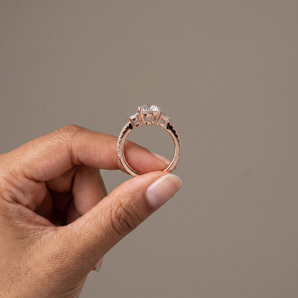 Rose Gold Round Moissanite Three Stone Engagement Ring