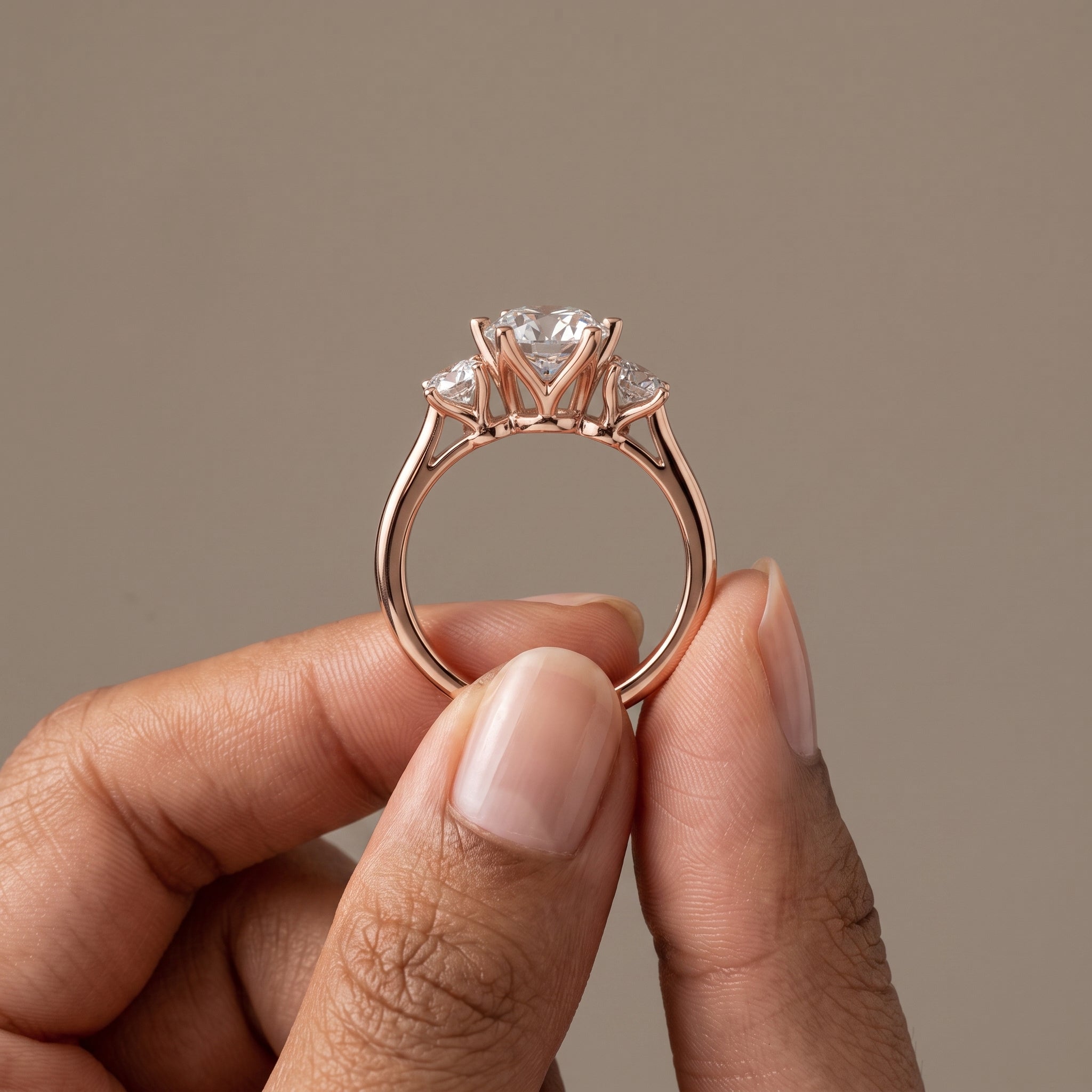 Rose Gold Round Moissanite Three Stone Engagement Ring