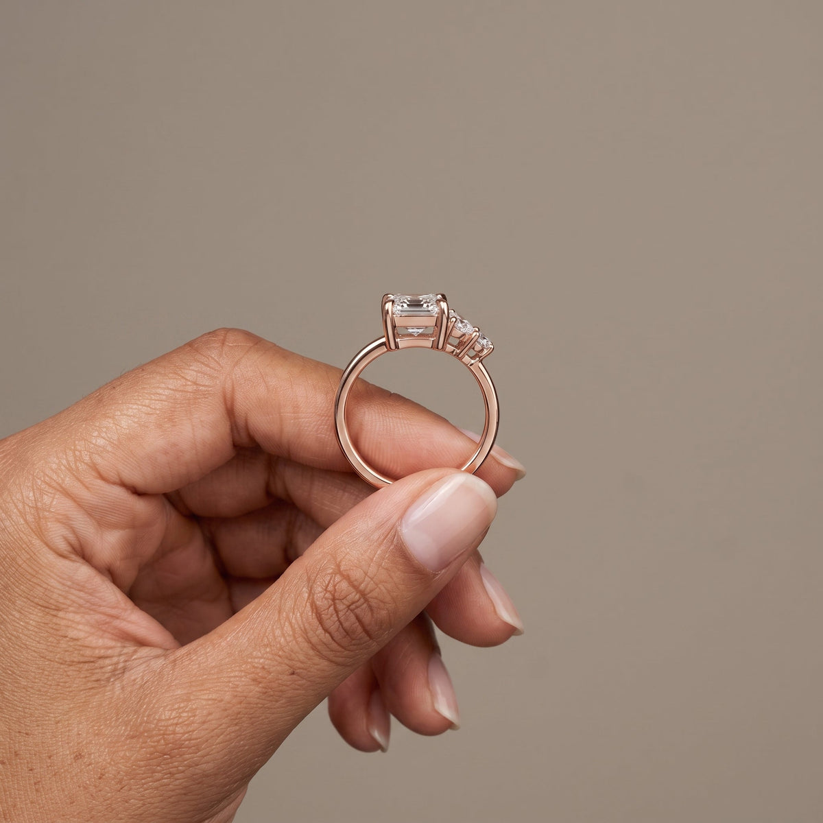 Rose Gold Emerald Cut Moissanite Three Stone Engagement Ring