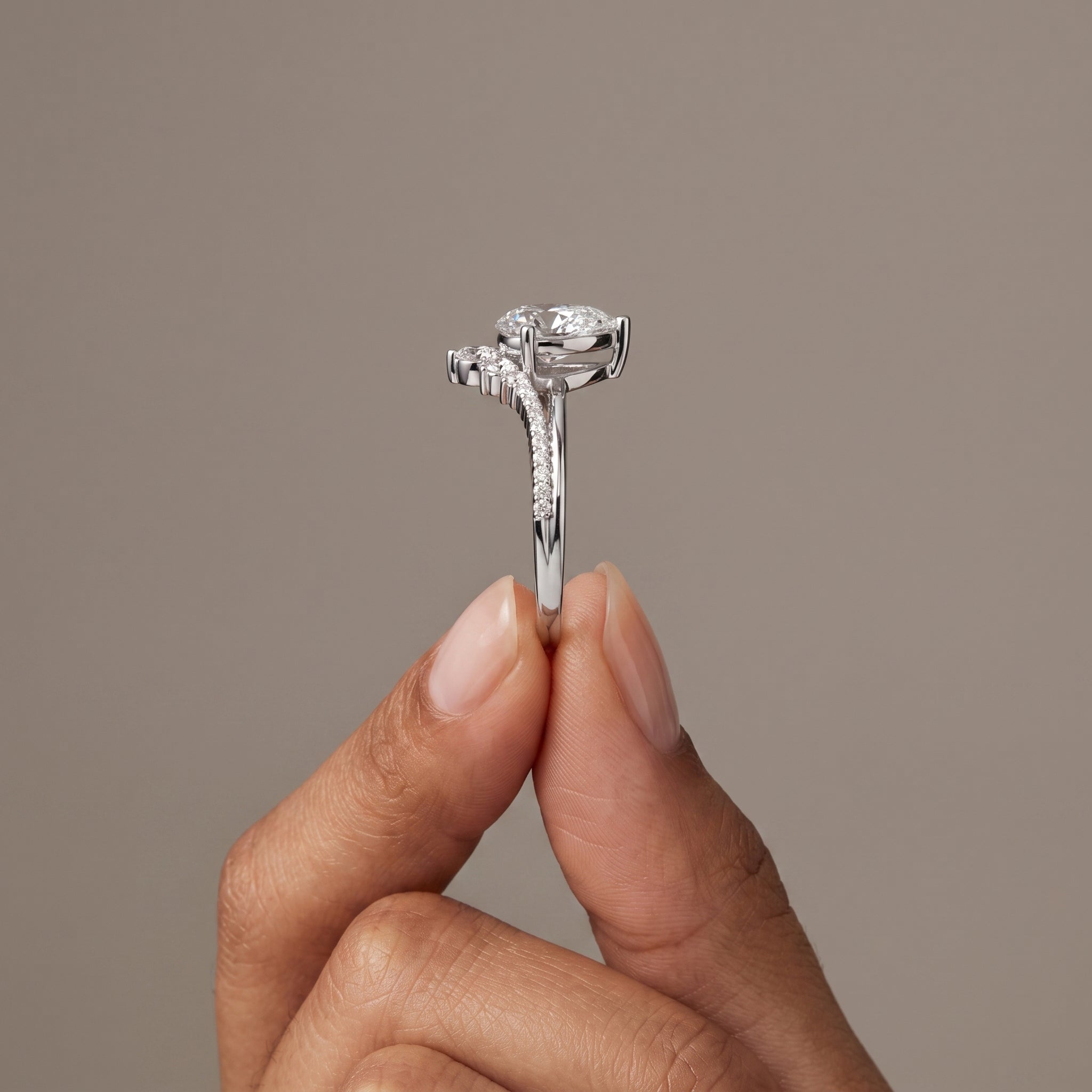 White Pear Cut Moissanite Engagement Ring with Accent Stones