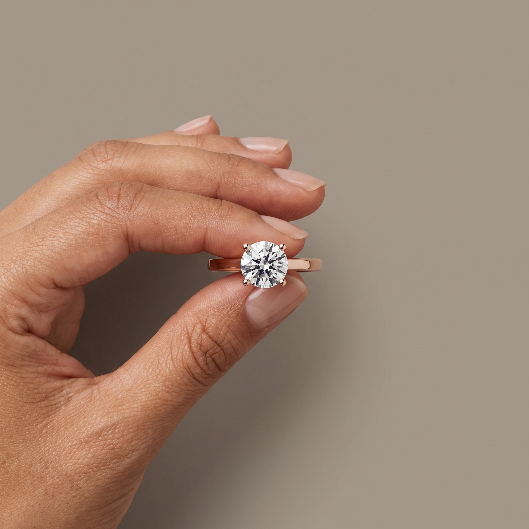 Rose Gold Round Moissanite Solitaire Engagement Ring
