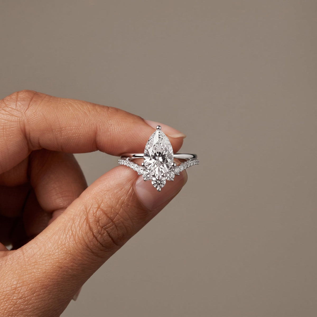 White Pear Cut Moissanite Engagement Ring with Accent Stones