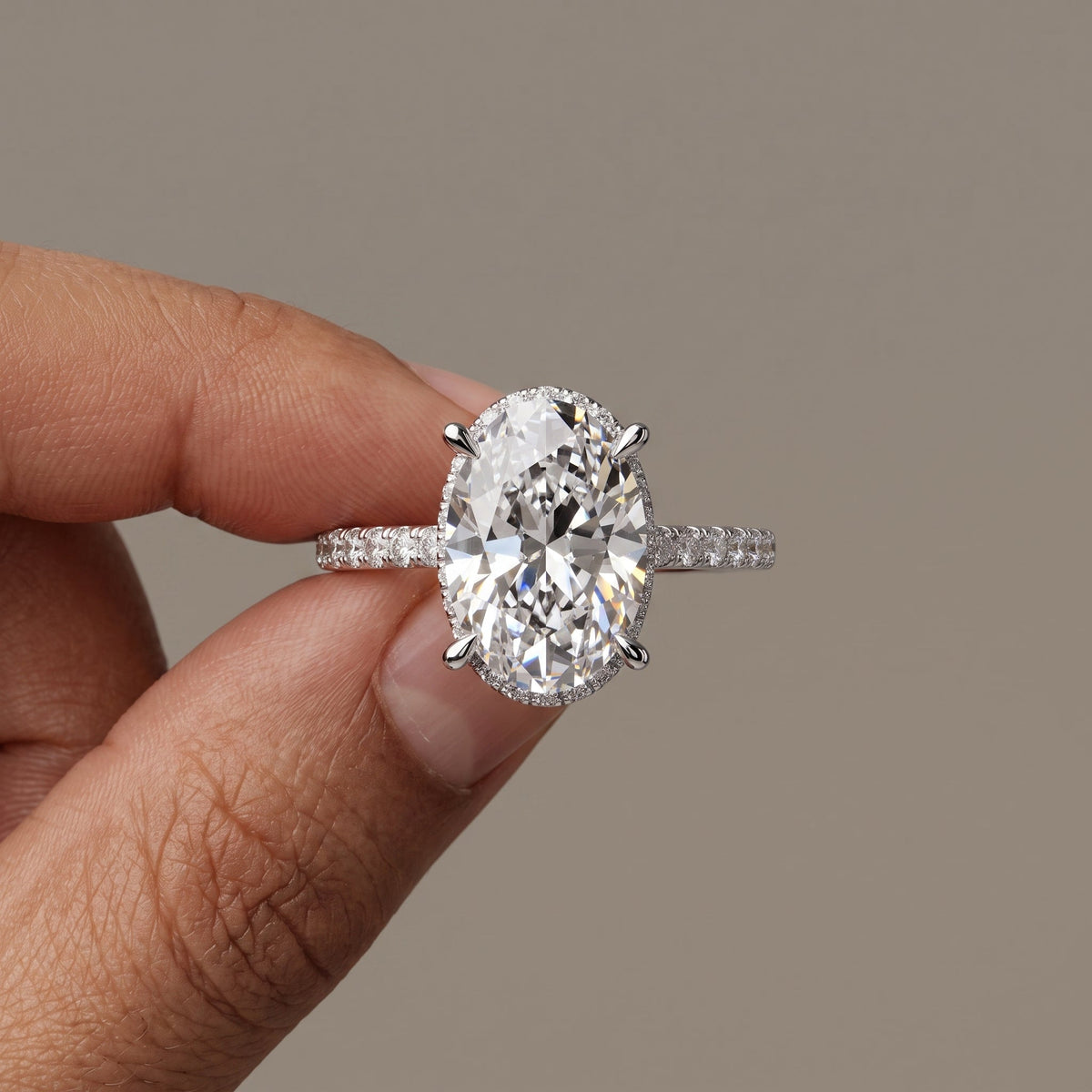 White Gold Oval Cut Moissanite Engagement Ring with Pavé Band