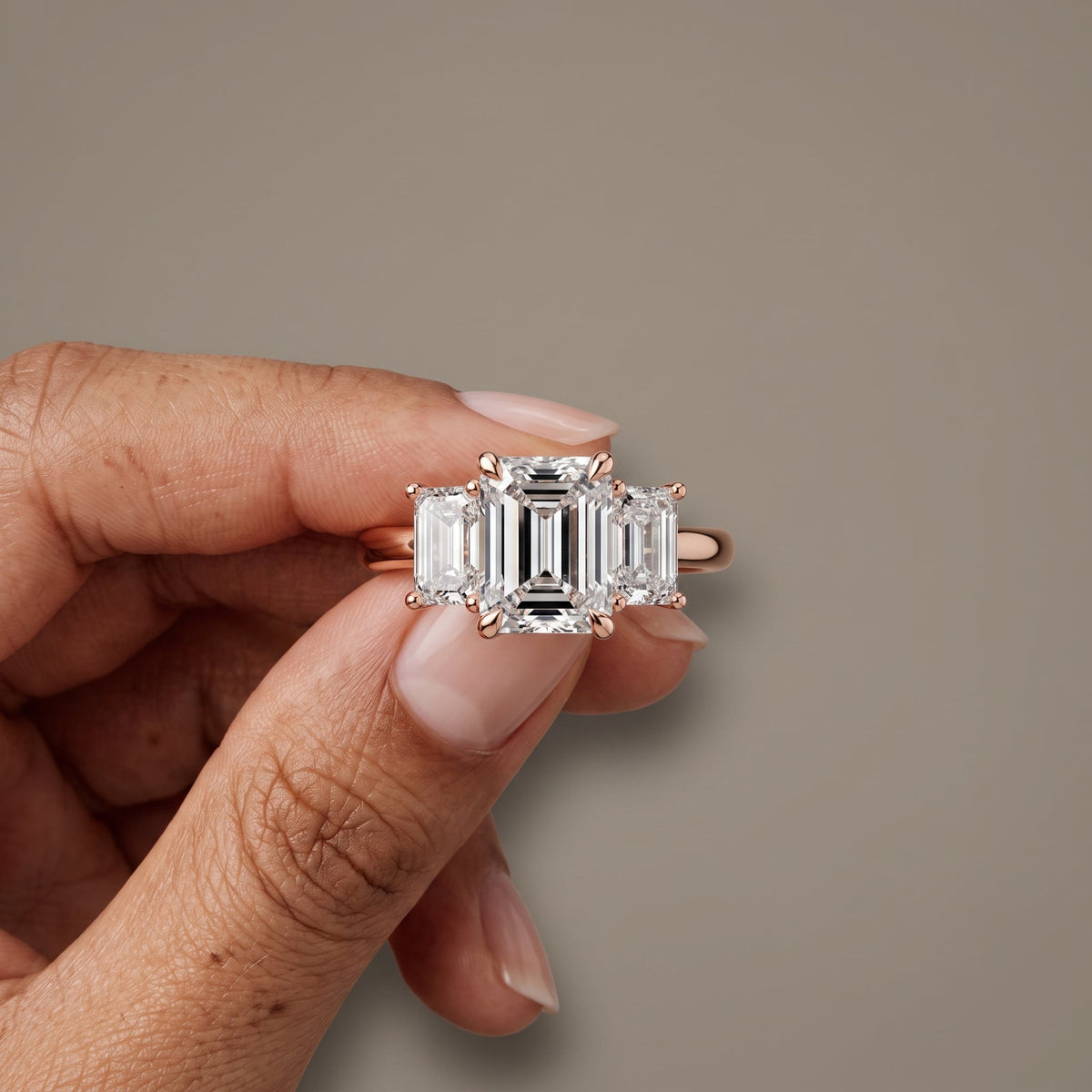 Rose Gold Emerald Cut Moissanite Three Stone Engagement Ring