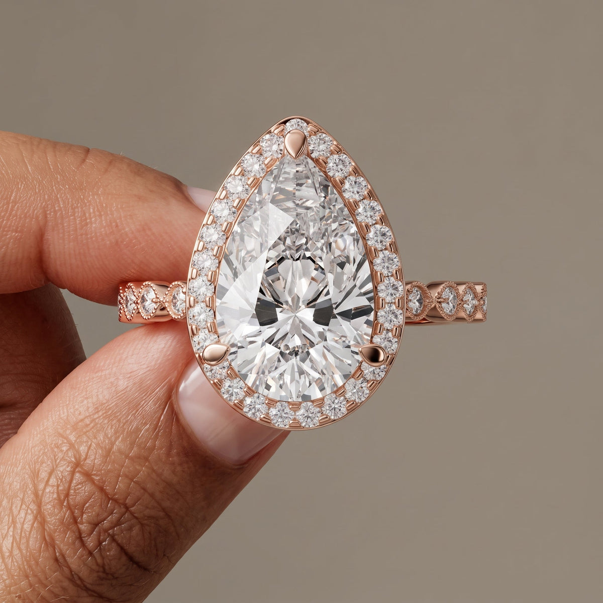 Rose Gold Pear Cut Moissanite Halo Engagement Ring
