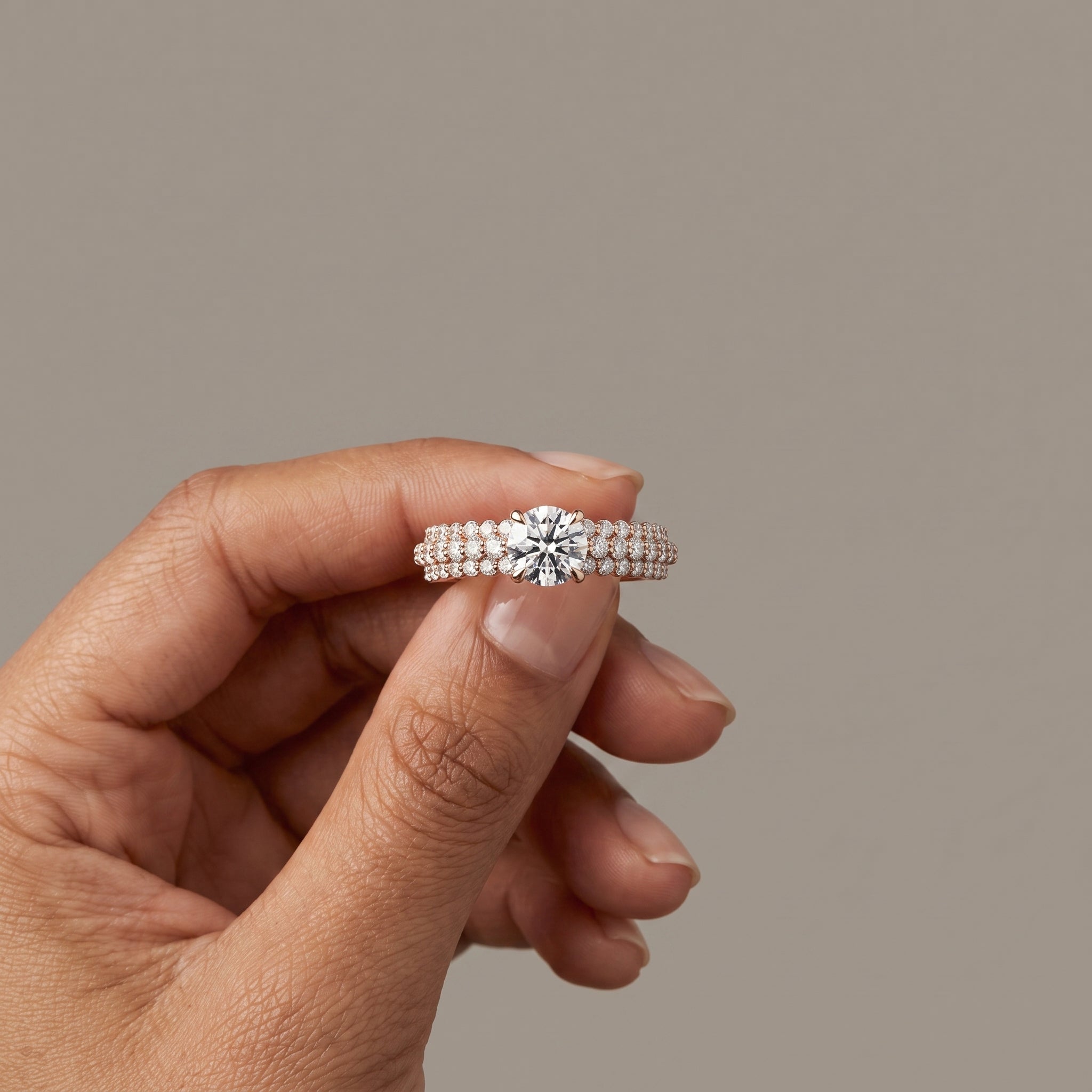 Rose Gold Round Moissanite Engagement Ring with Pavé Band