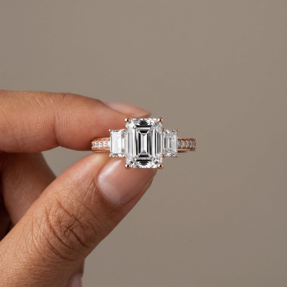 Rose Gold Emerald Cut Moissanite Three Stone Engagement Ring