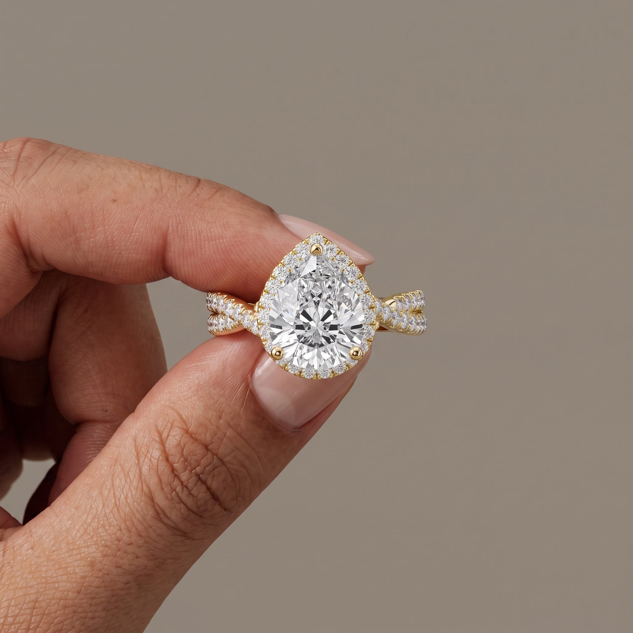Yellow Gold Pear Cut Moissanite Halo Engagement Ring