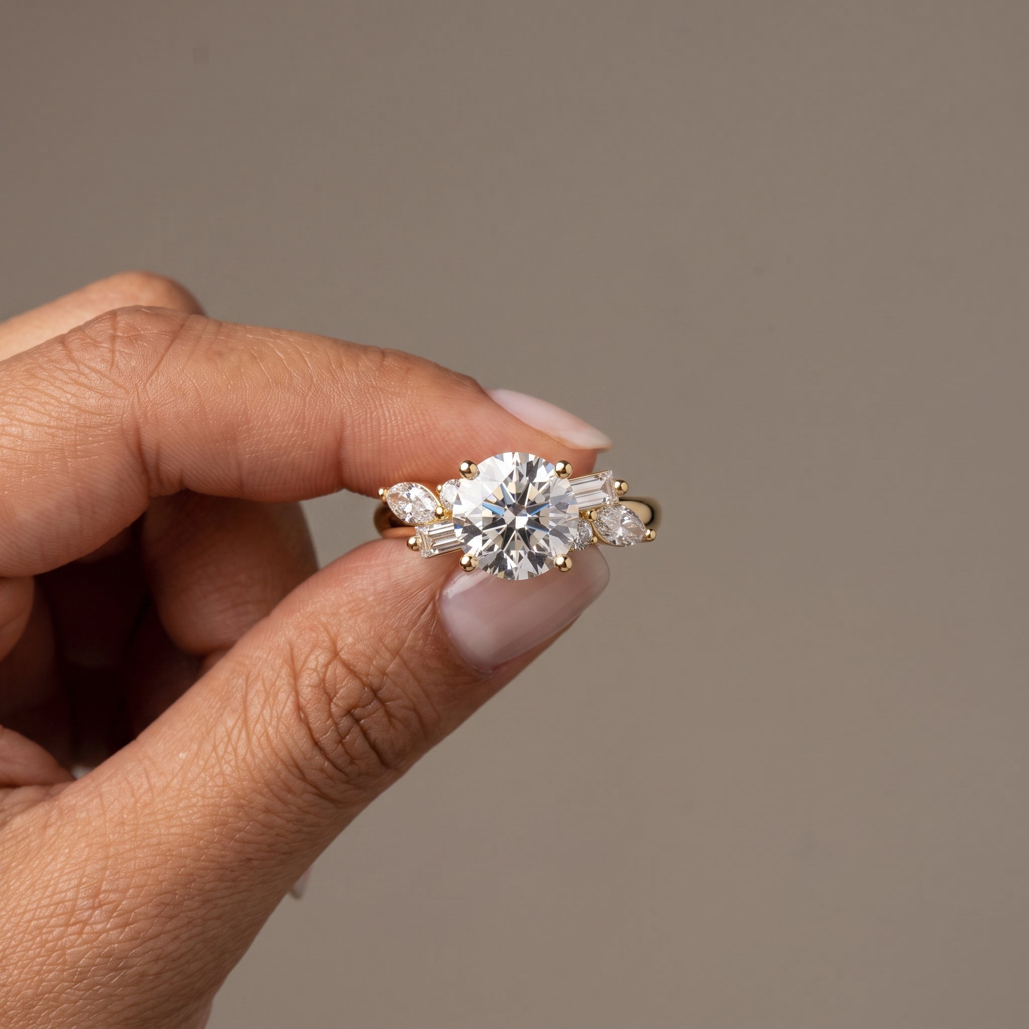 Yellow Gold Round Moissanite Engagement Ring with Mixed Side Stones