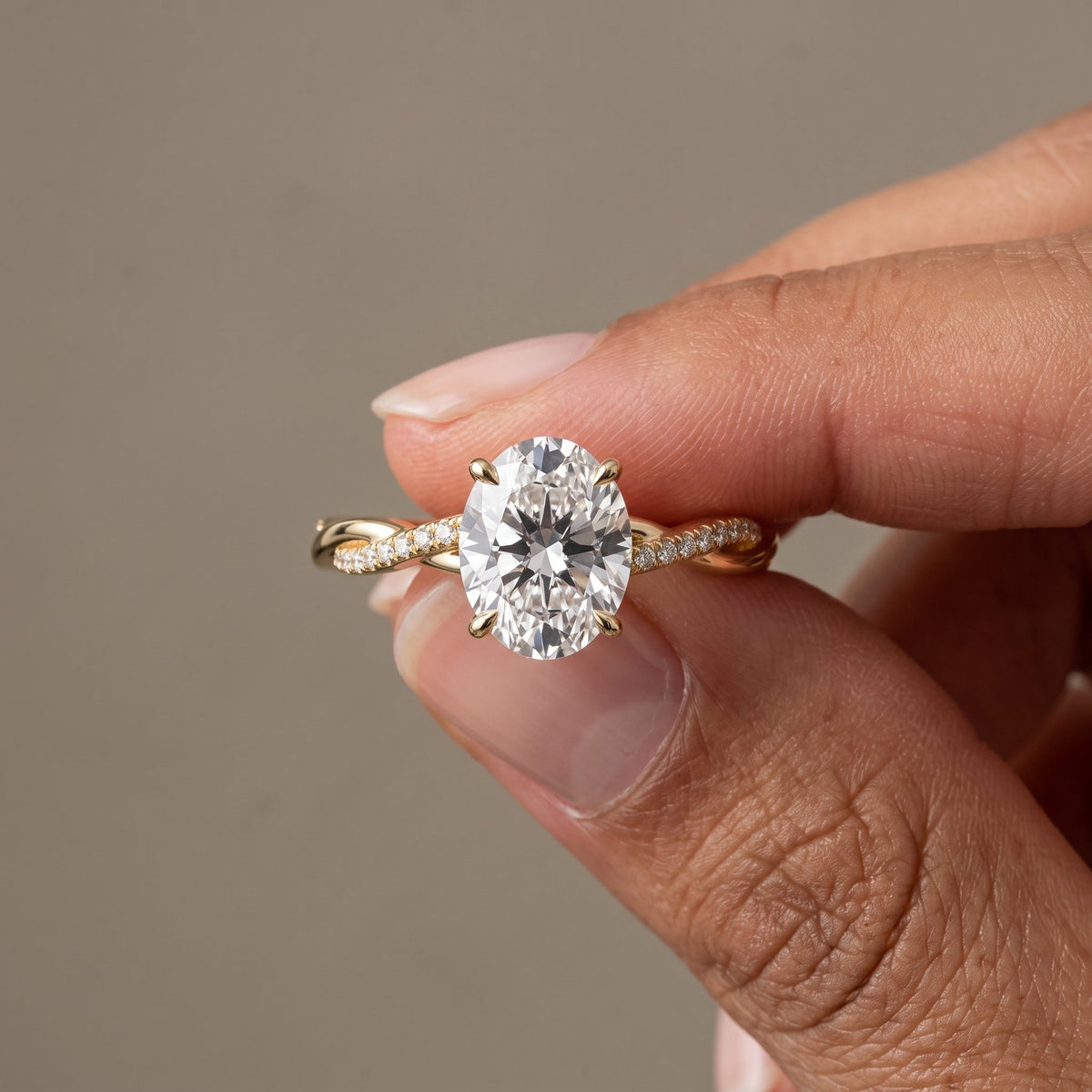 Yellow Gold Oval Cut Moissanite Twisted Engagement Ring