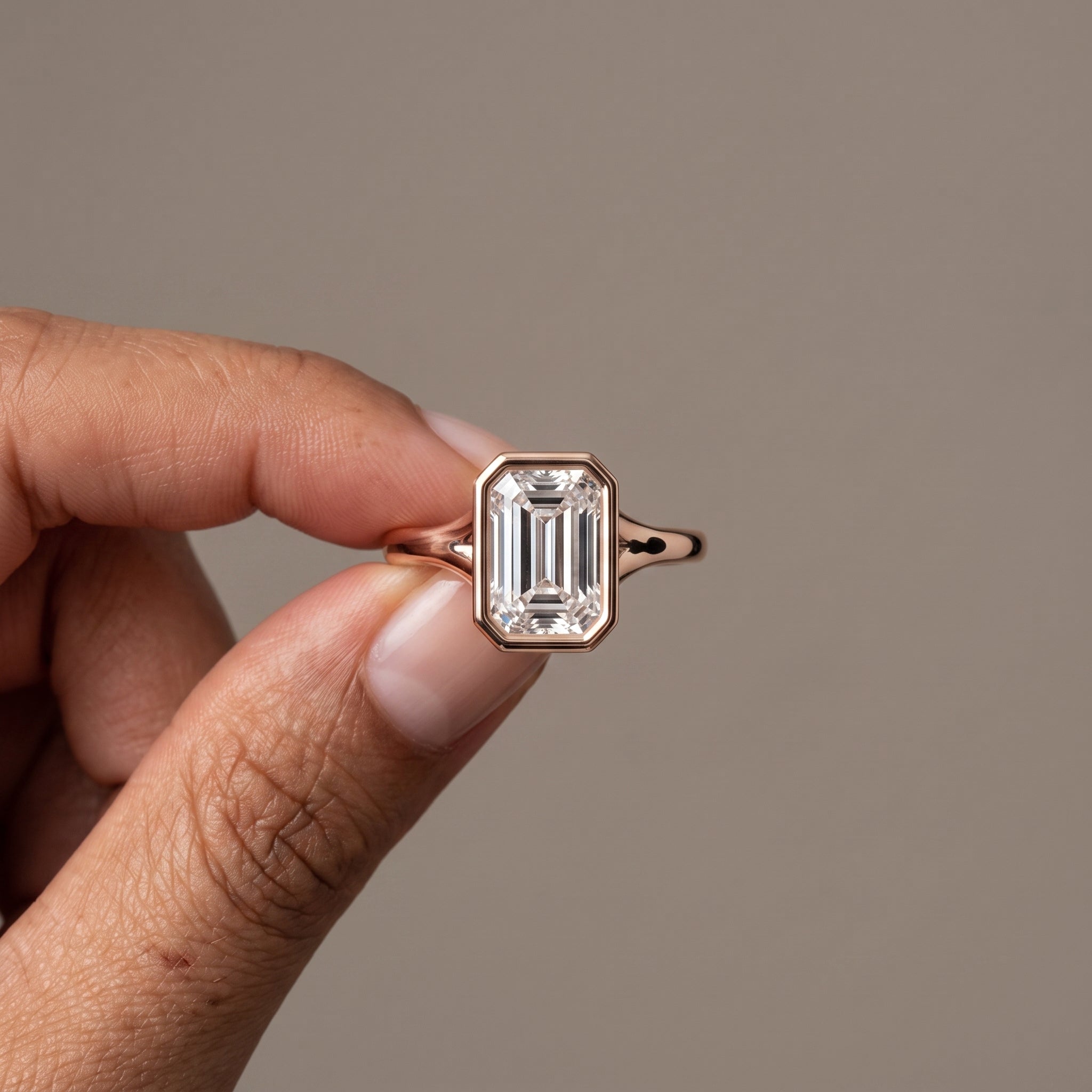 Rose Gold Emerald Cut Moissanite Bezel Engagement Ring