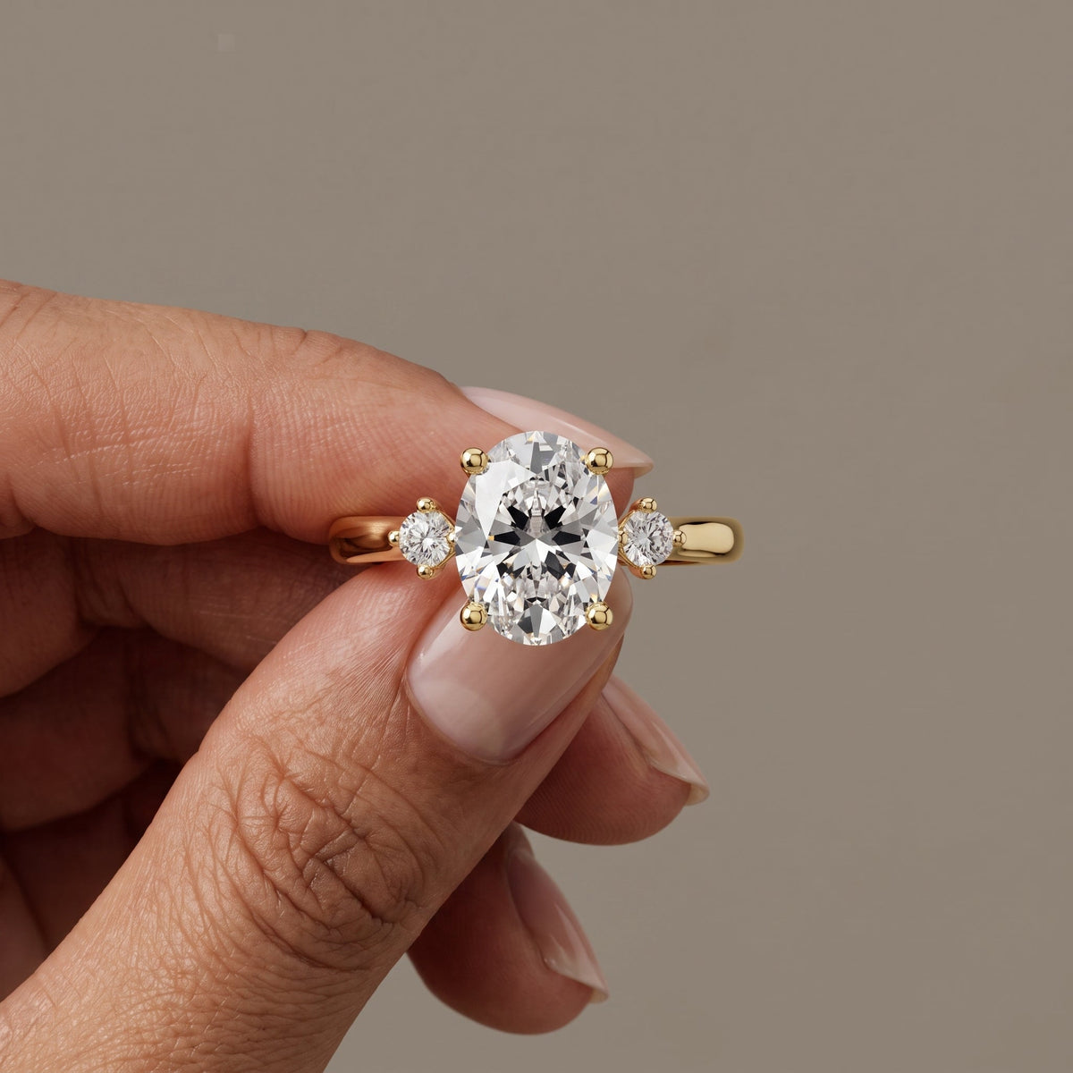 Yellow Gold Oval Moissanite Three Stone Engagement Ring