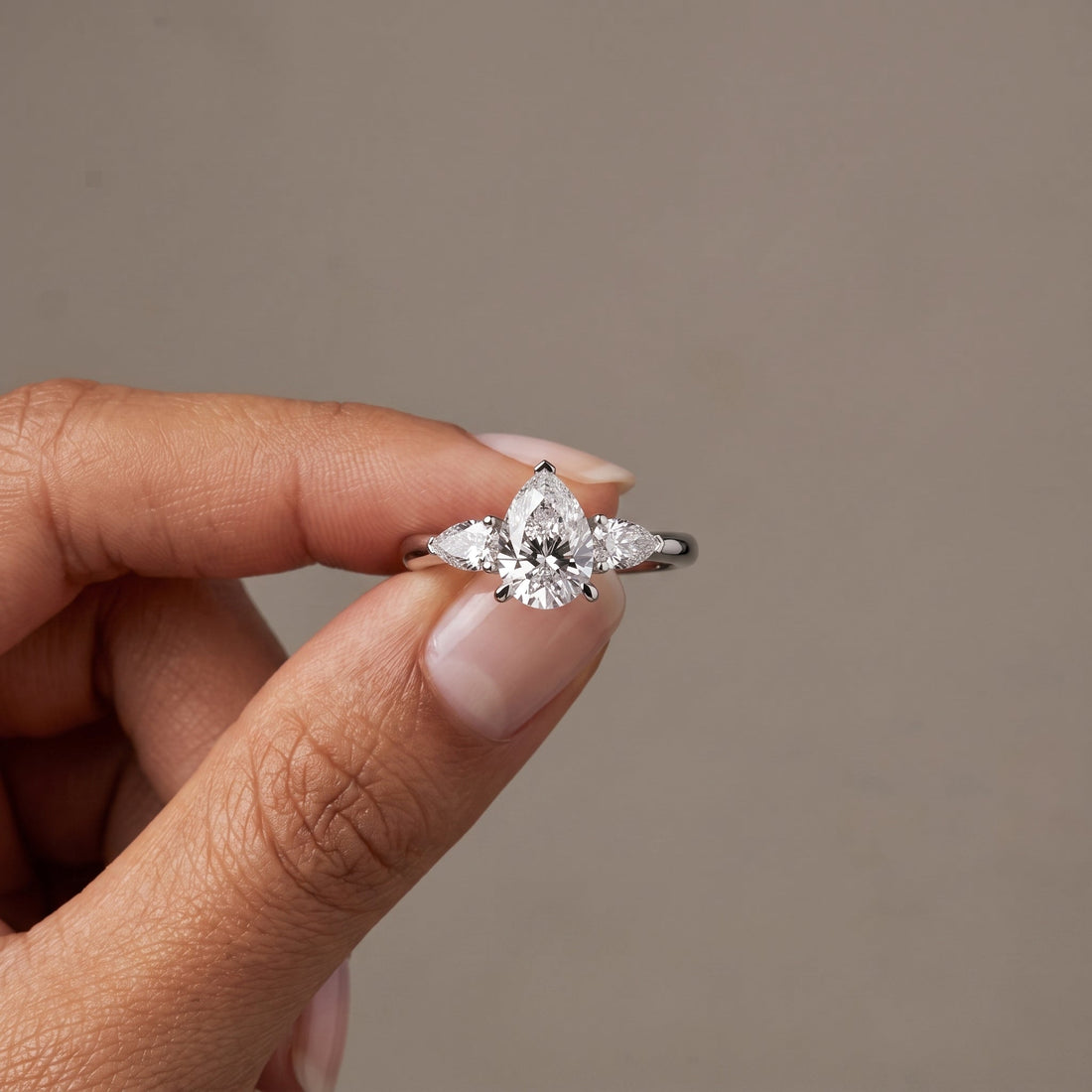 White Gold Pear Cut Three Stone Engagement Ring