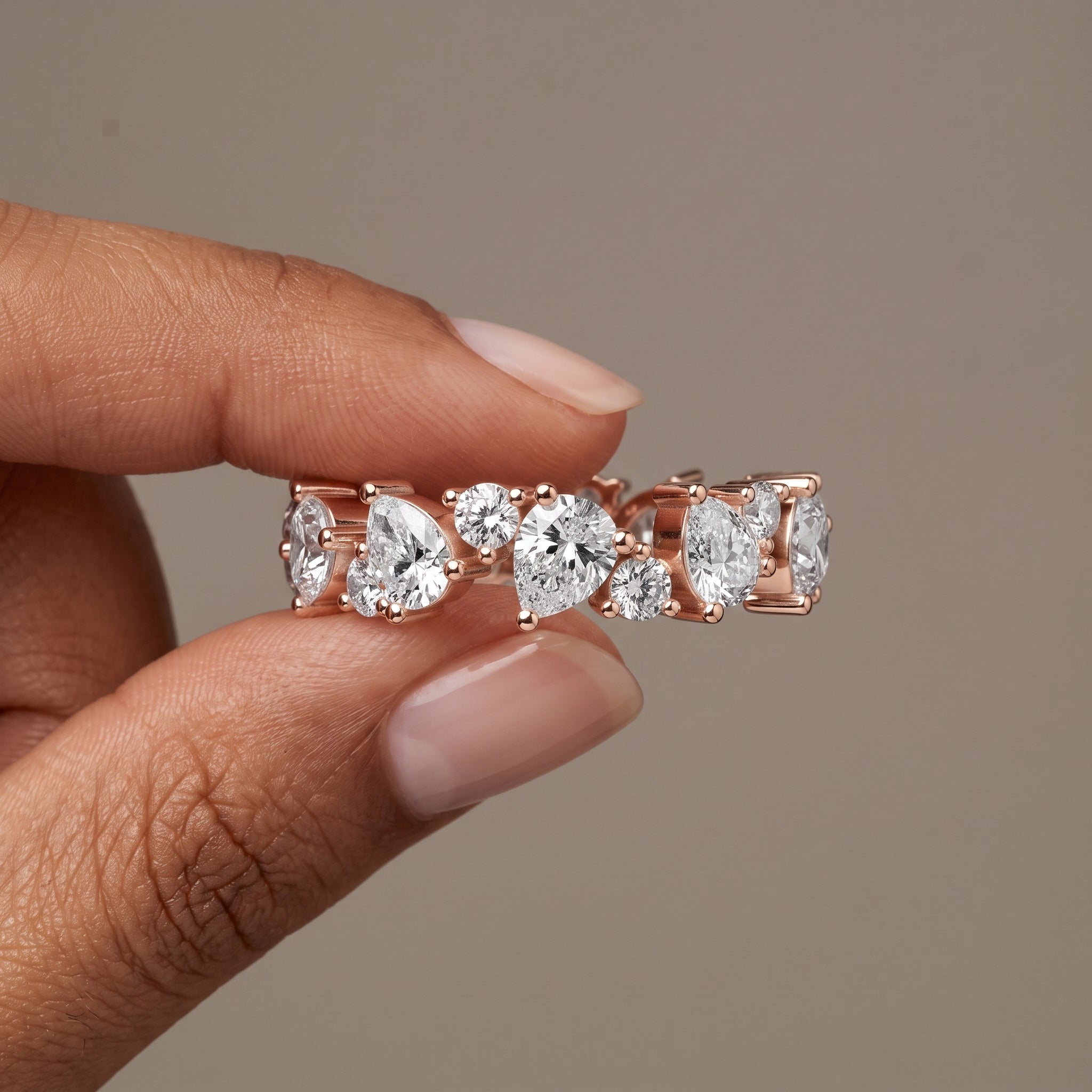 Rose Gold Pear & Round Moissanite Eternity Band Ring