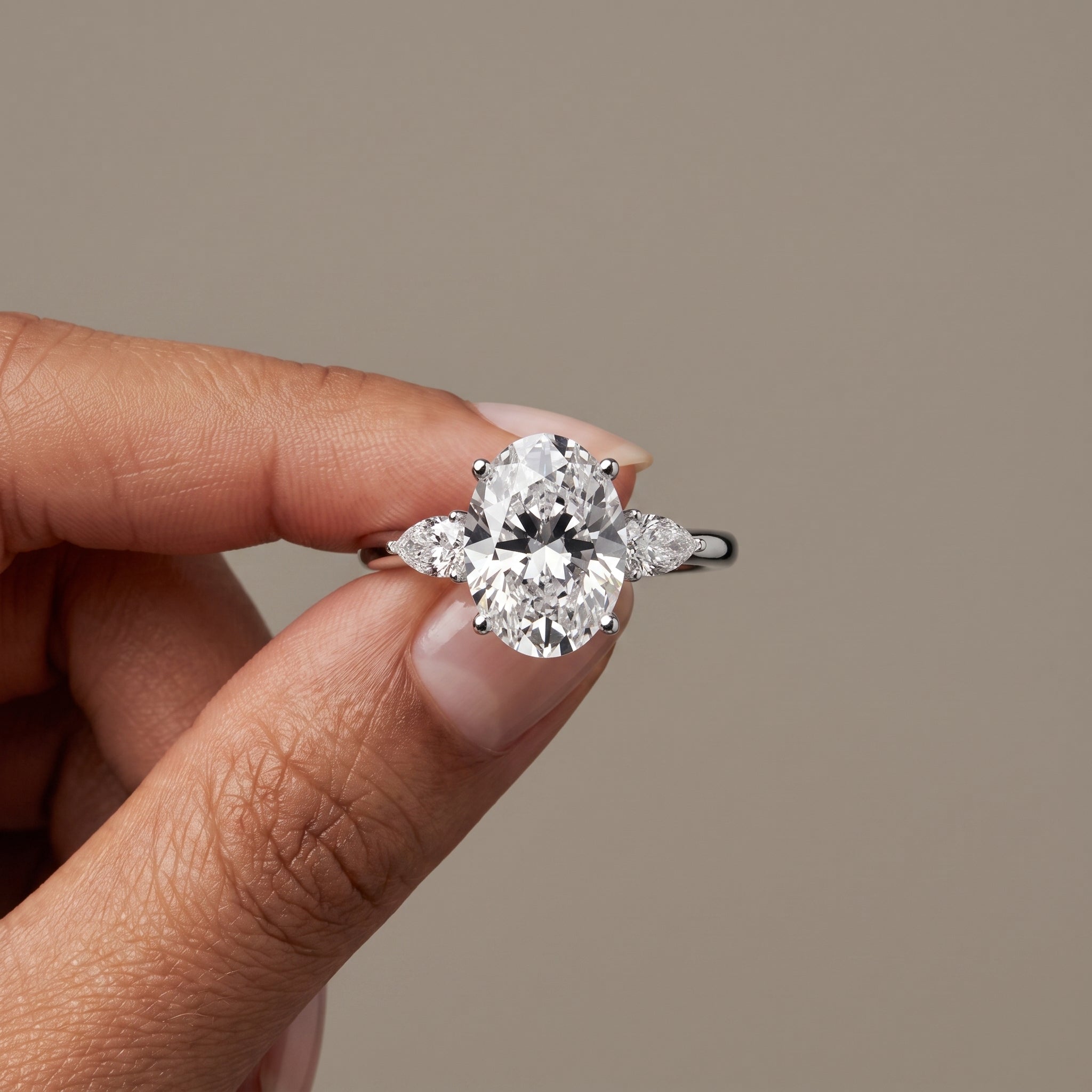 White Gold Oval Moissanite Three-Stone Engagement Ring