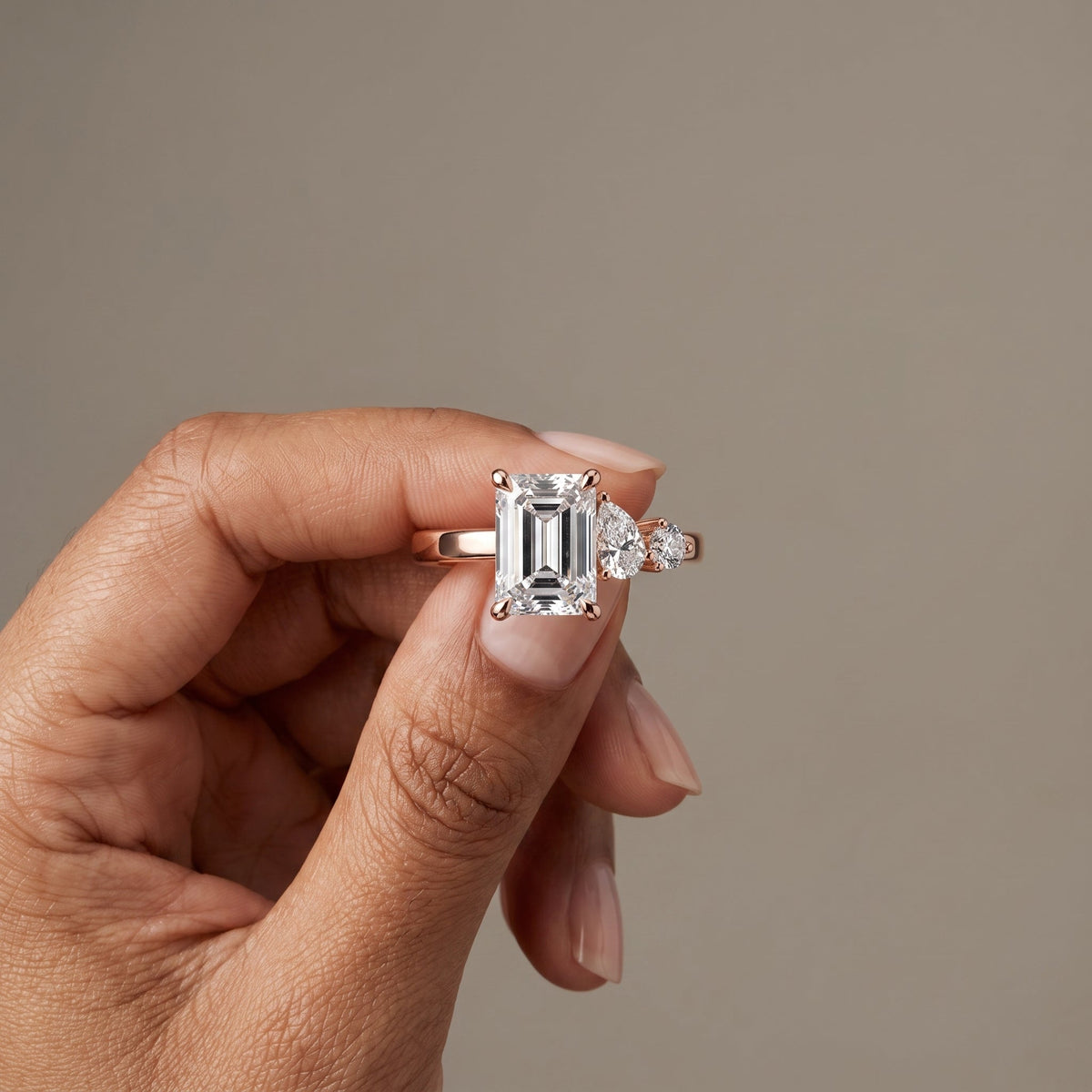 Rose Gold Emerald Cut Moissanite Three Stone Engagement Ring