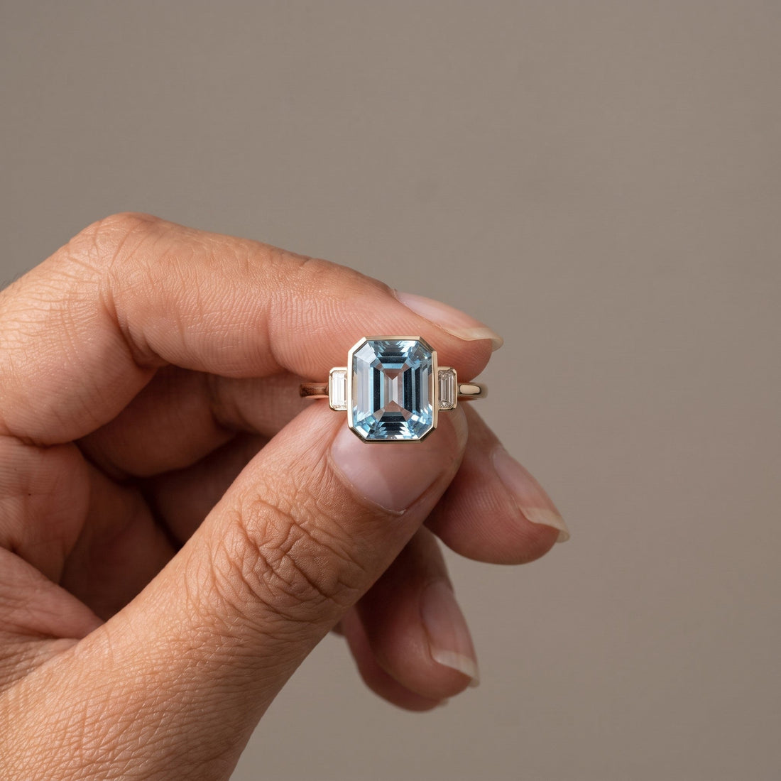 Yellow Gold Emerald Cut Blue Three-Stone Ring