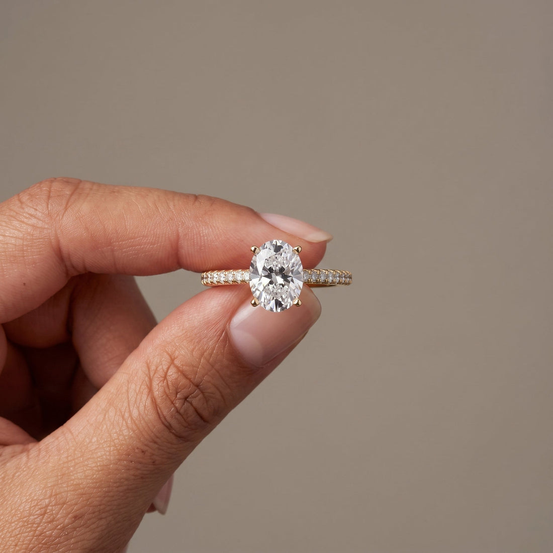 Yellow Gold Oval Cut Engagement Ring with Pavé Band