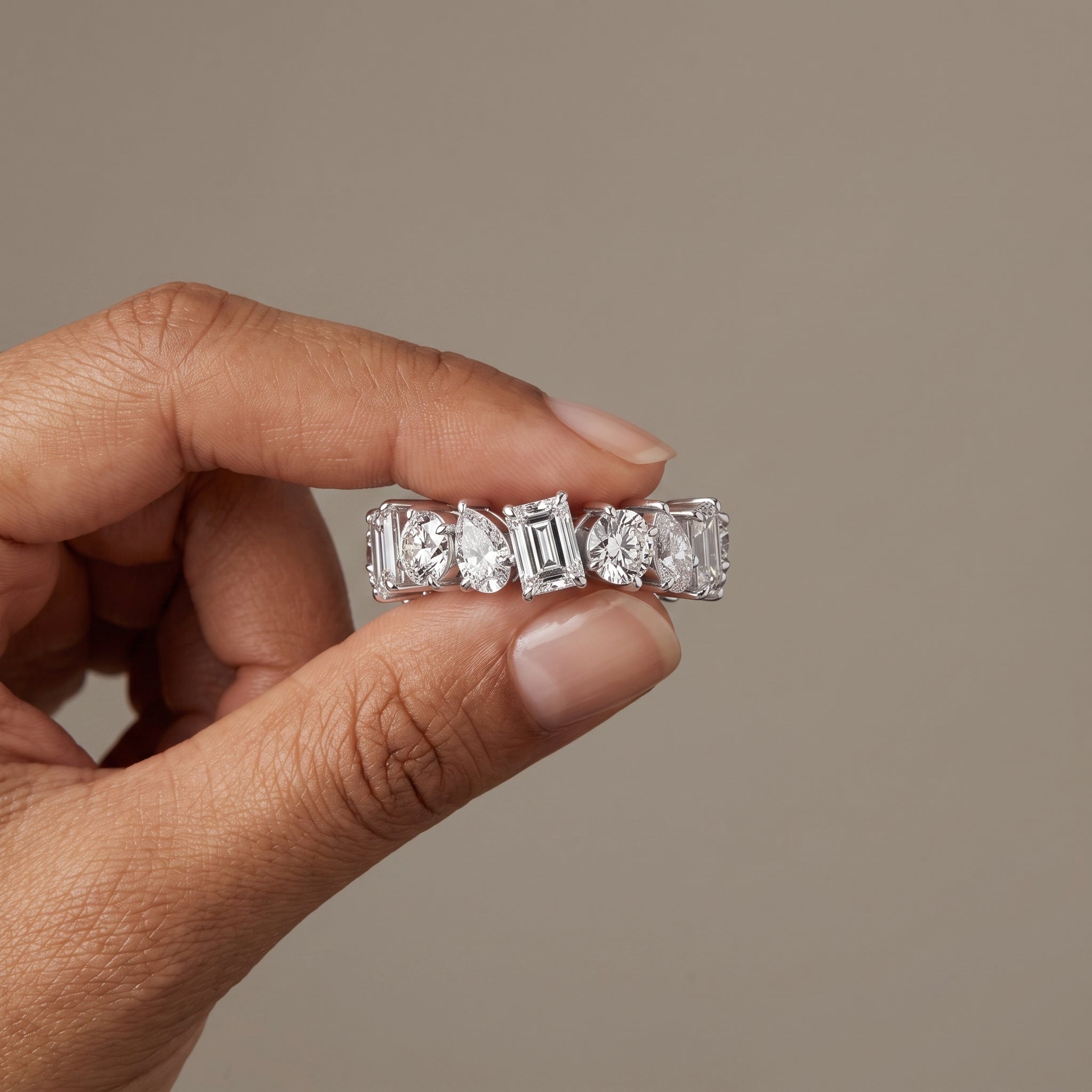 White Metal Alternating Emerald, Pear & Round Moissanite Eternity Band Ring