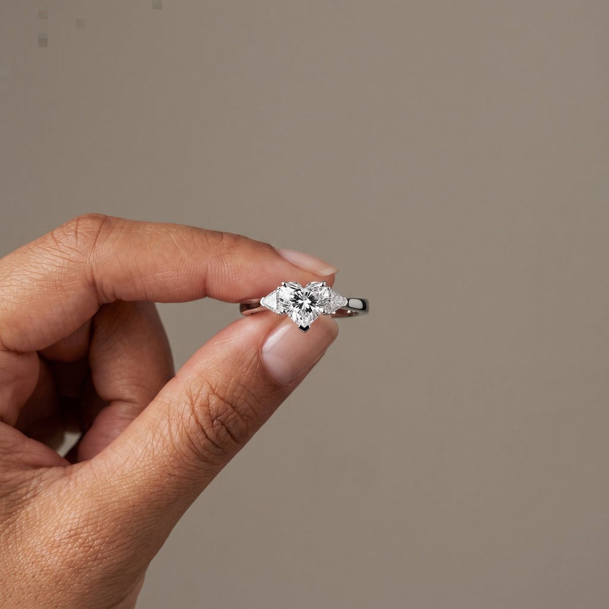 White Metal Heart Cut Moissanite Three Stone Engagement Ring
