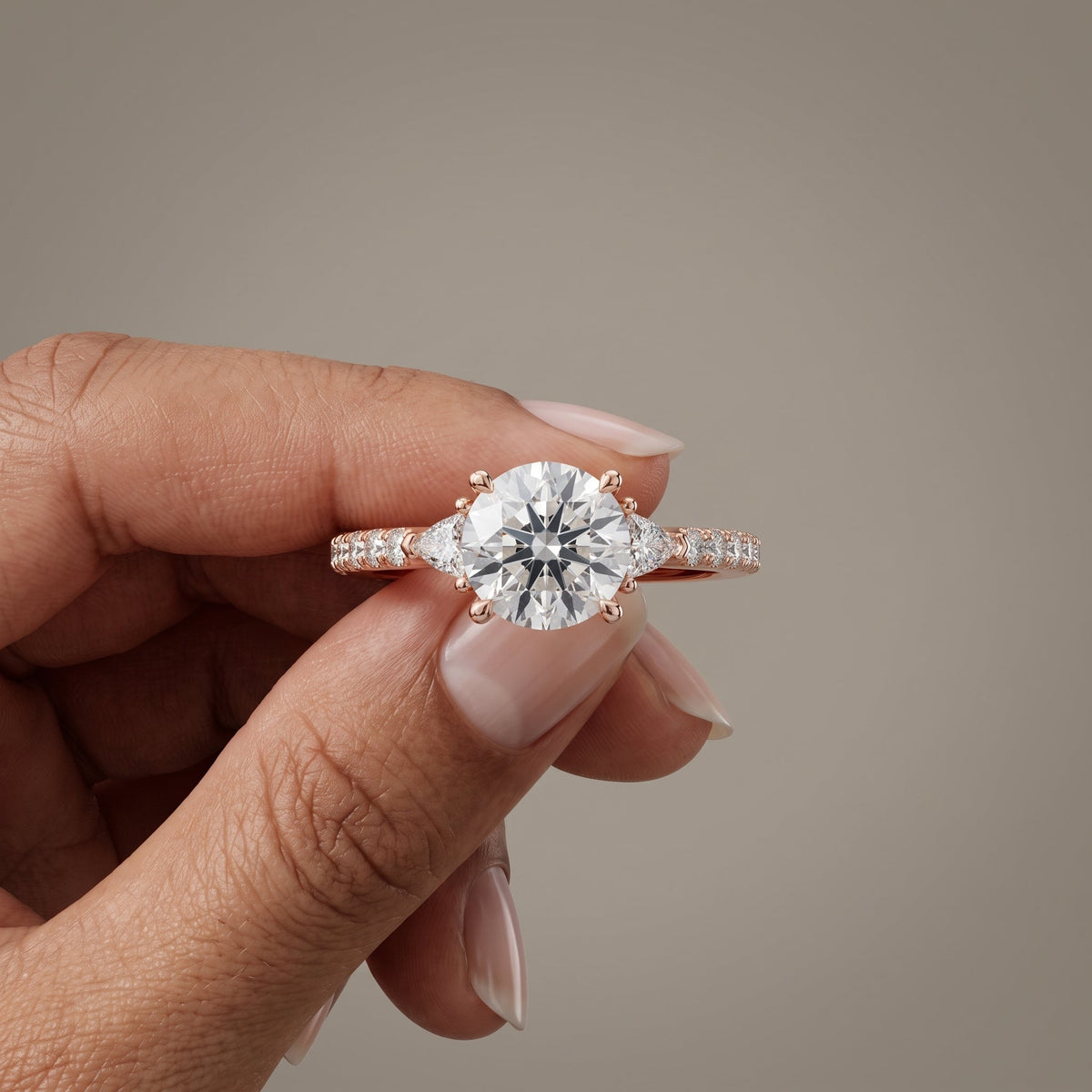 Rose Gold Round Moissanite Three Stone Engagement Ring