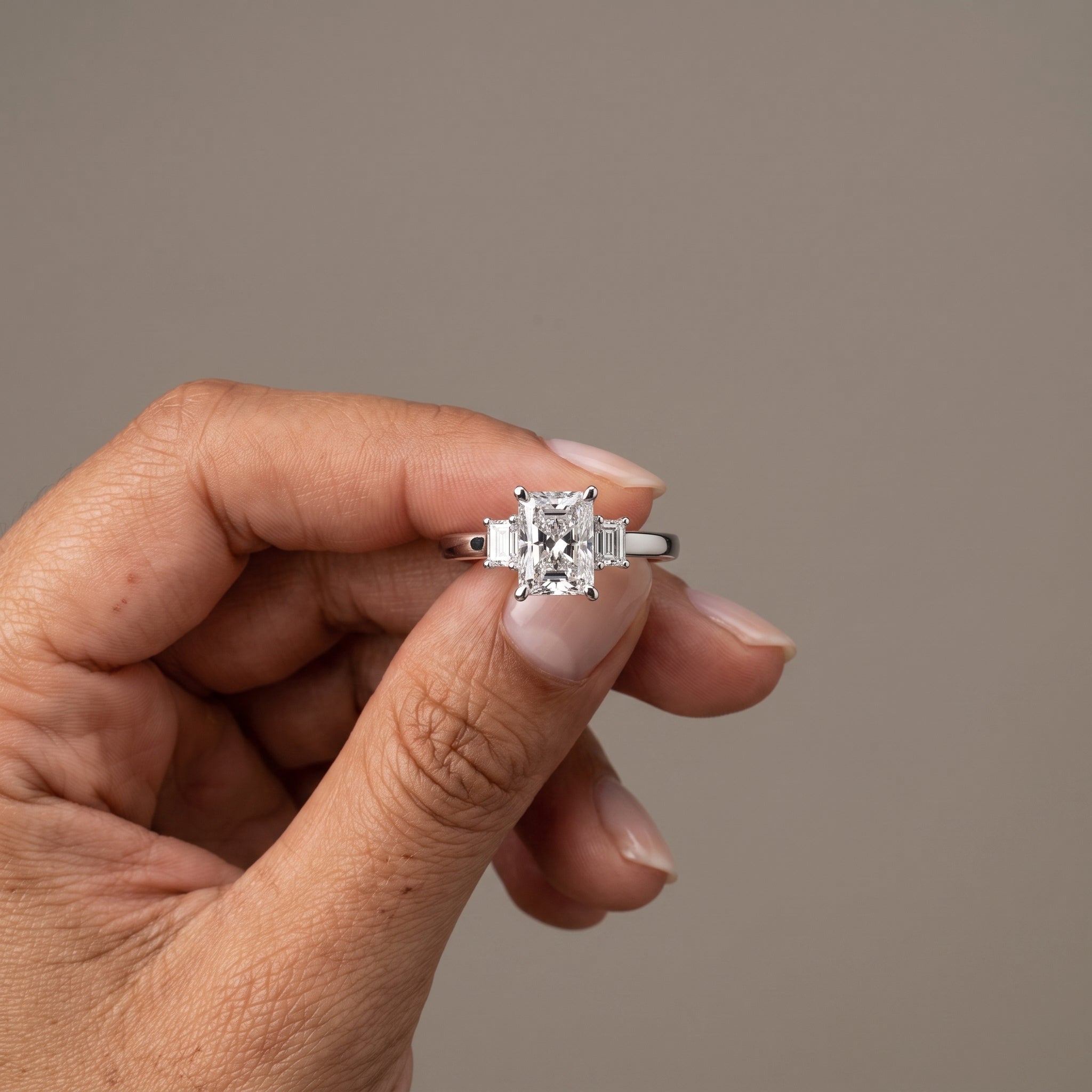White Metal Radiant Cut Moissanite Three Stone Engagement Ring