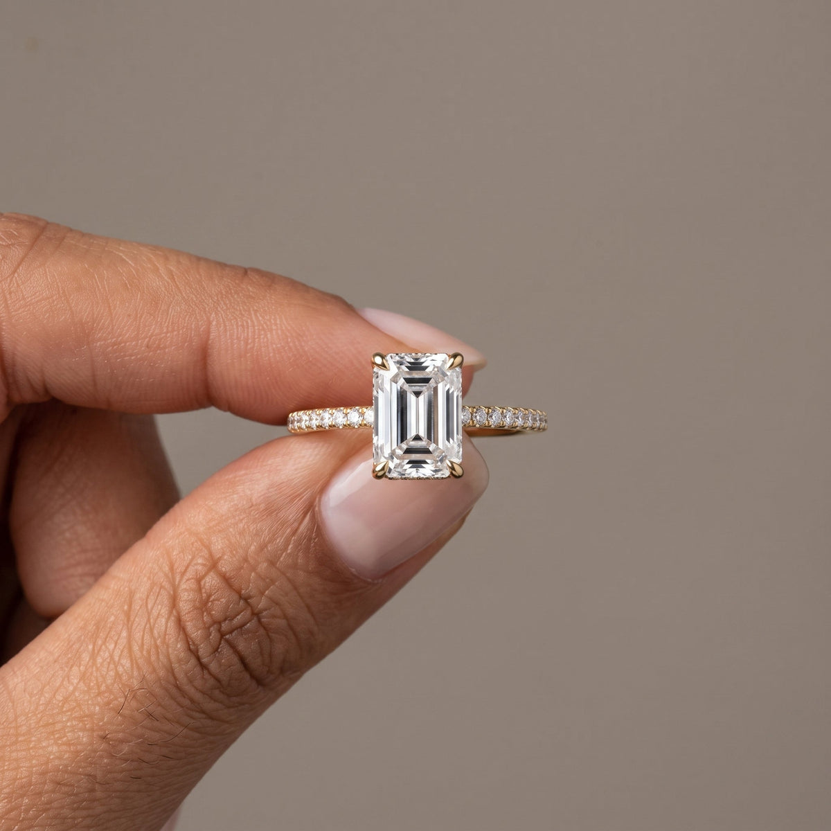 Yellow Gold Emerald Cut Moissanite Engagement Ring