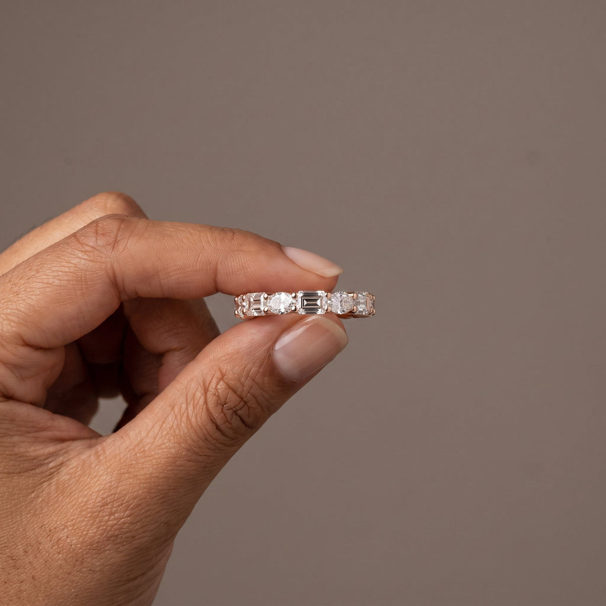 Rose Gold Alternating Oval & Emerald Cut Moissanite Eternity Band