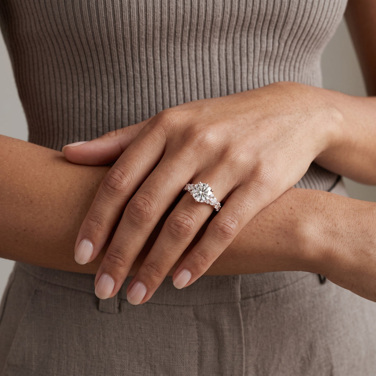 Rose Gold Round Moissanite Engagement Ring with Side Accent Stones