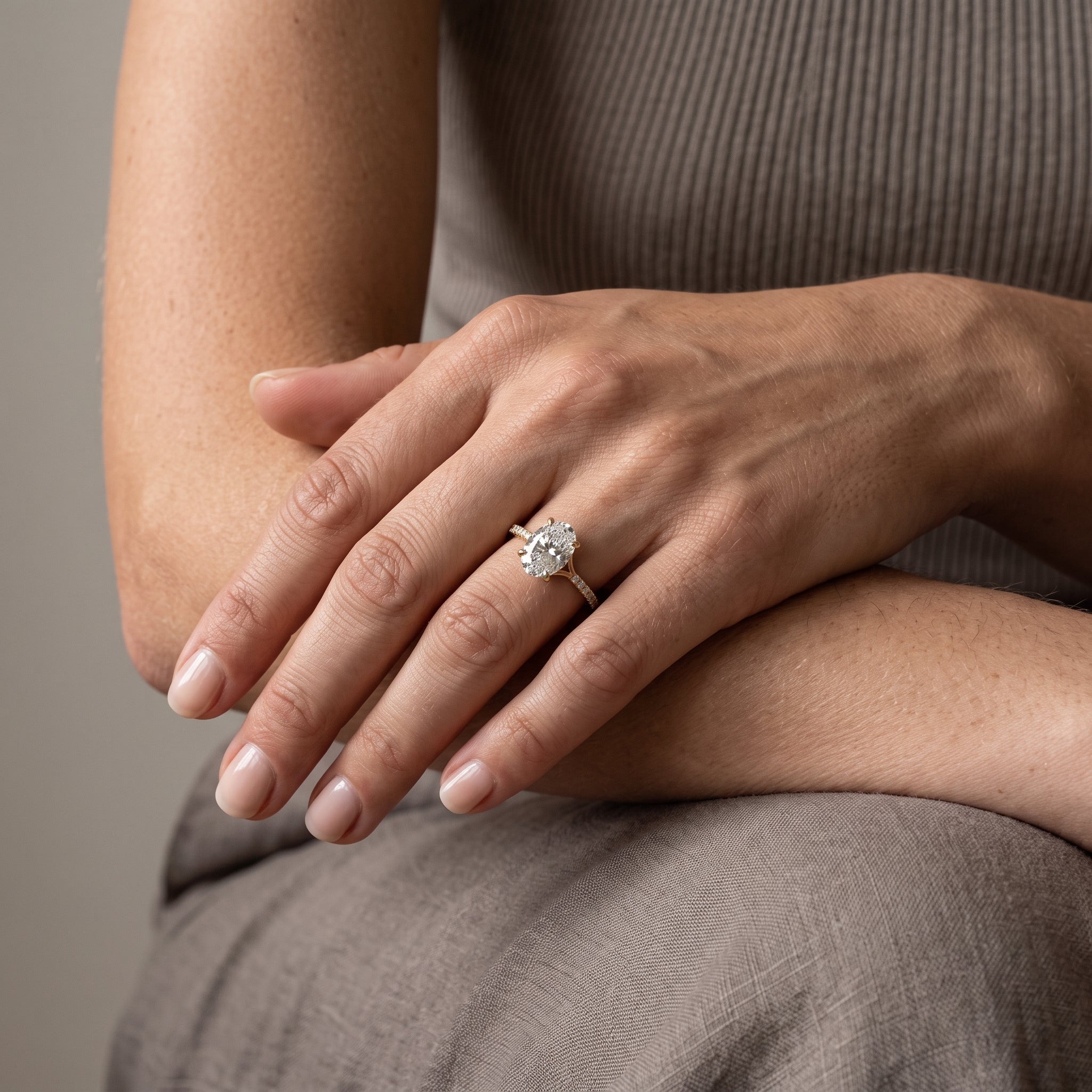 Yellow Gold Oval Moissanite Engagement Ring with Pavé Band