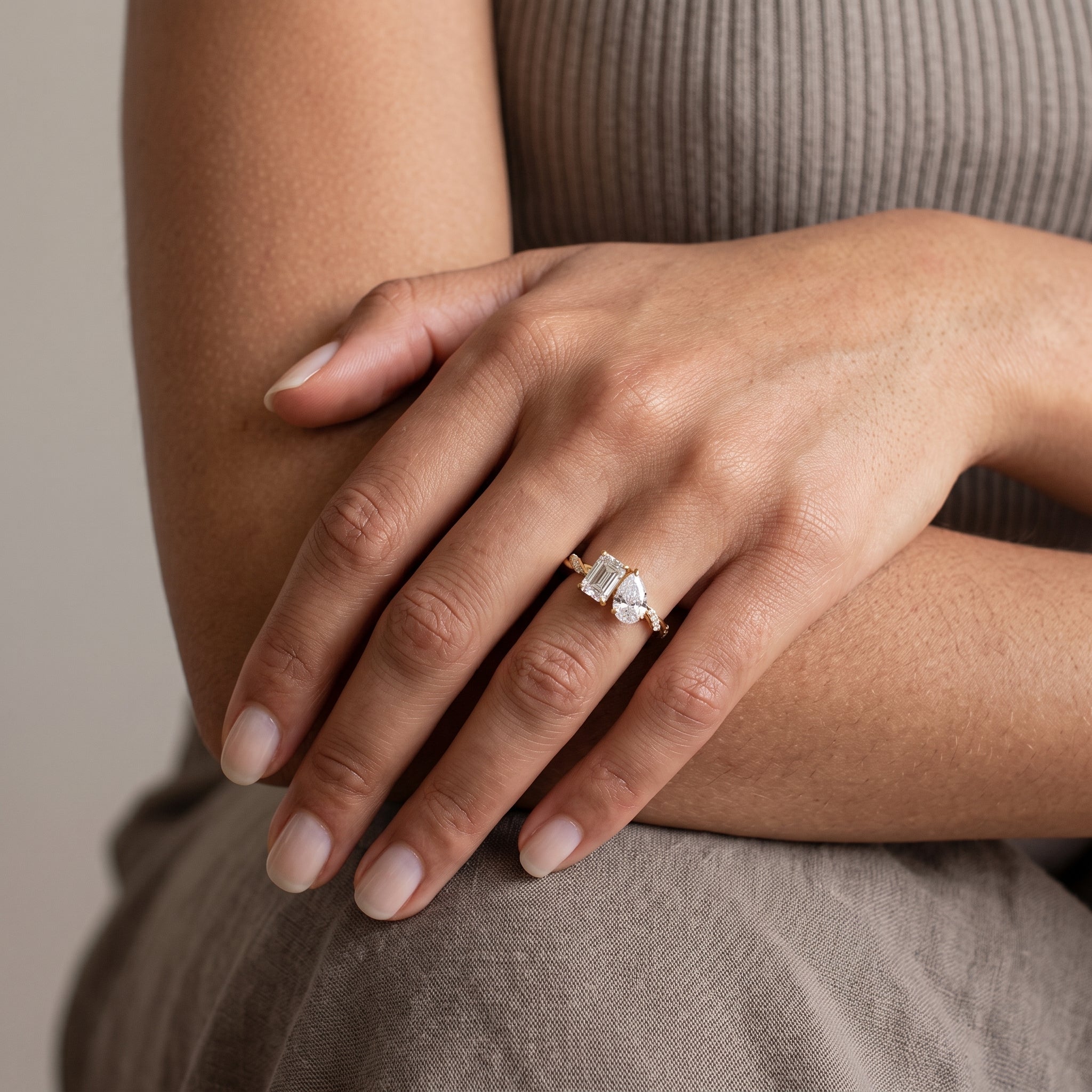 Yellow Gold Emerald & Pear Cut Moissanite Twist Ring