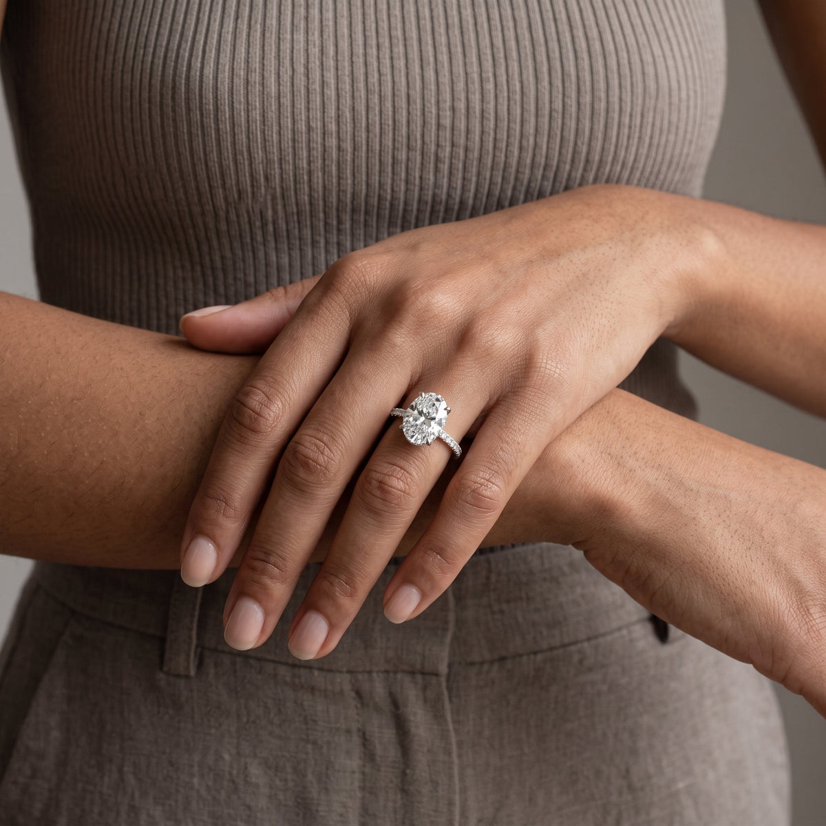 White Gold Oval Cut Moissanite Engagement Ring with Pavé Band