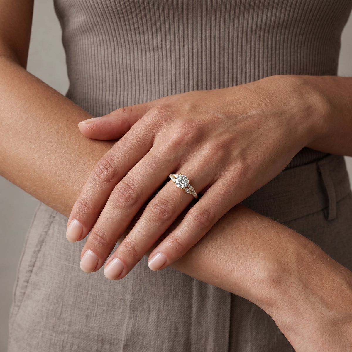 Yellow Gold Round Moissanite Engagement Ring with Leaf Accents