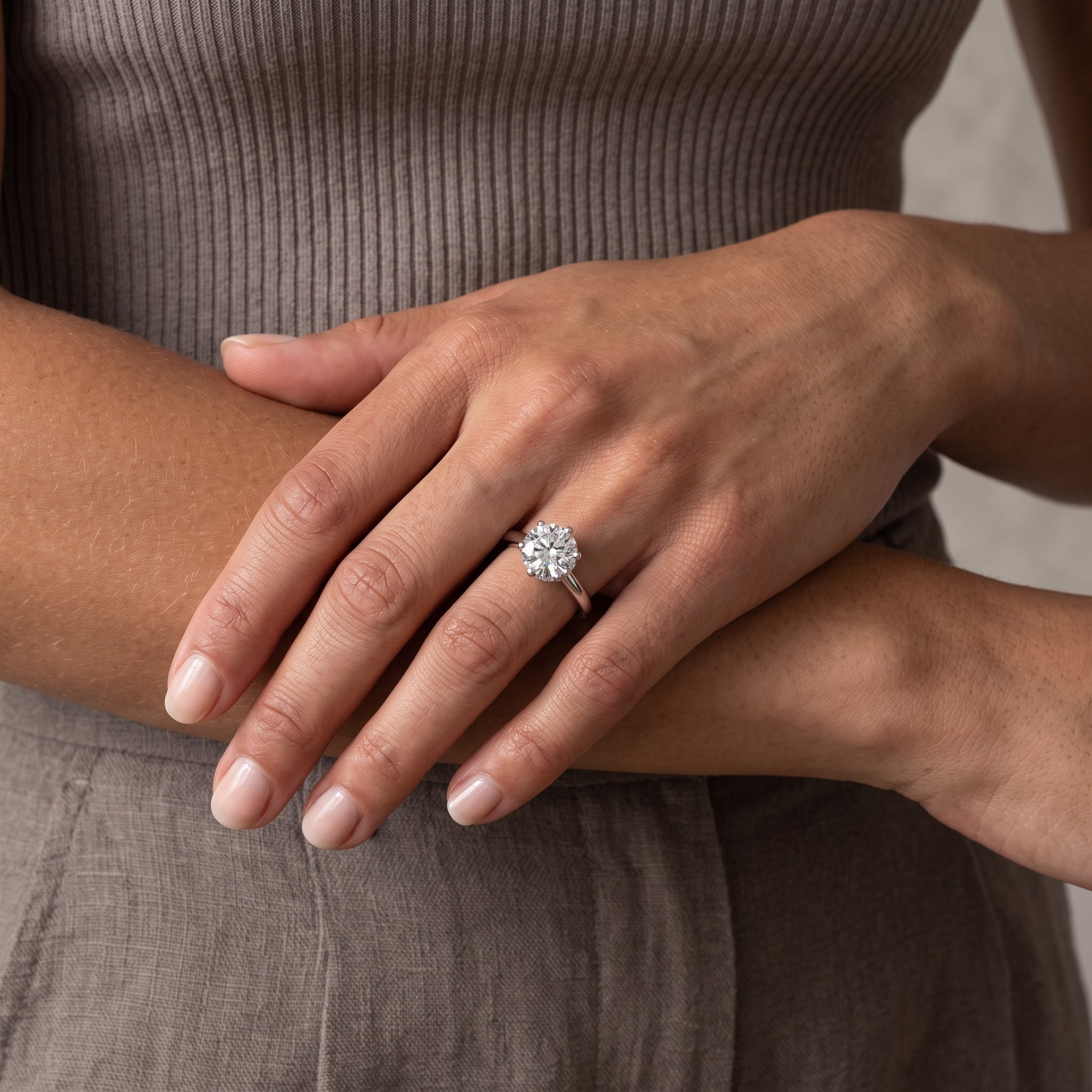 White Metal Round Brilliant Moissanite Solitaire Engagement Ring