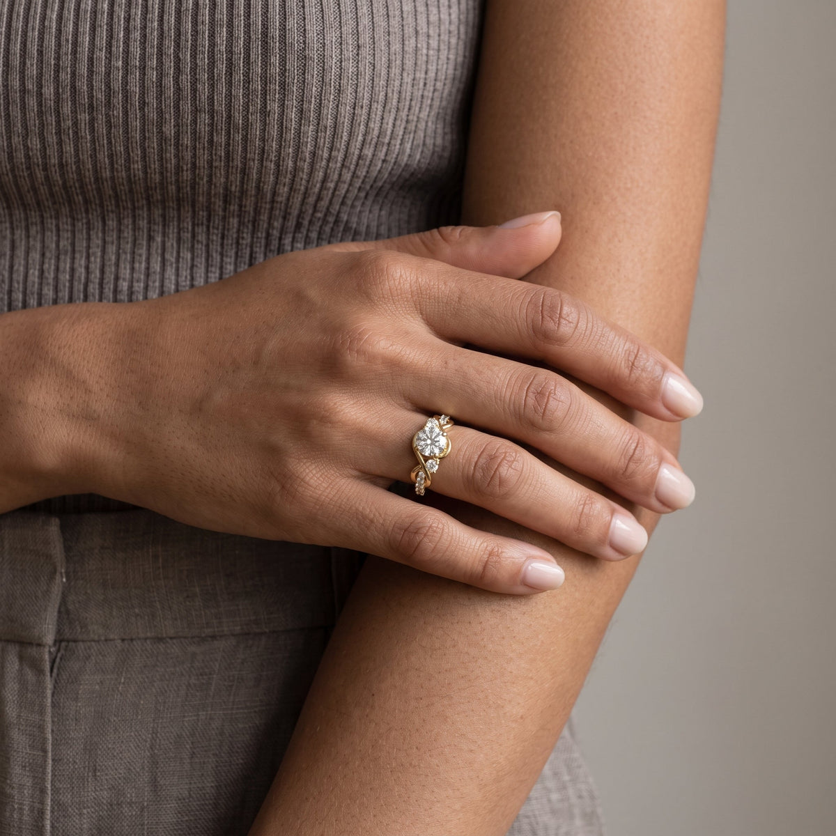 Yellow Gold Round Moissanite Twisted Three Stone Engagement Ring
