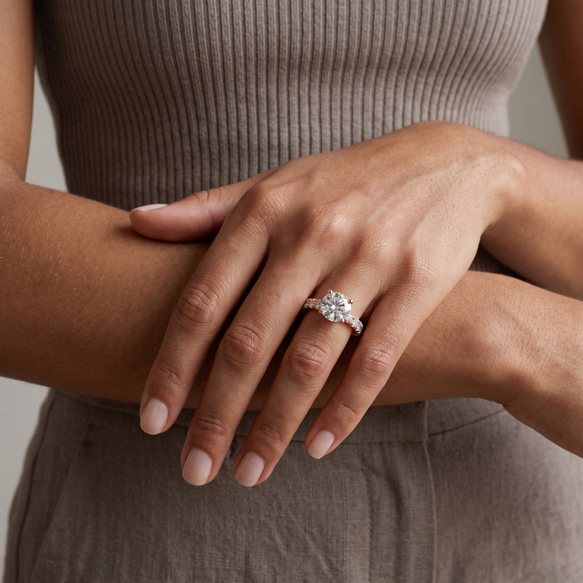Rose Gold Round Cut Moissanite Engagement Ring with Side Stones