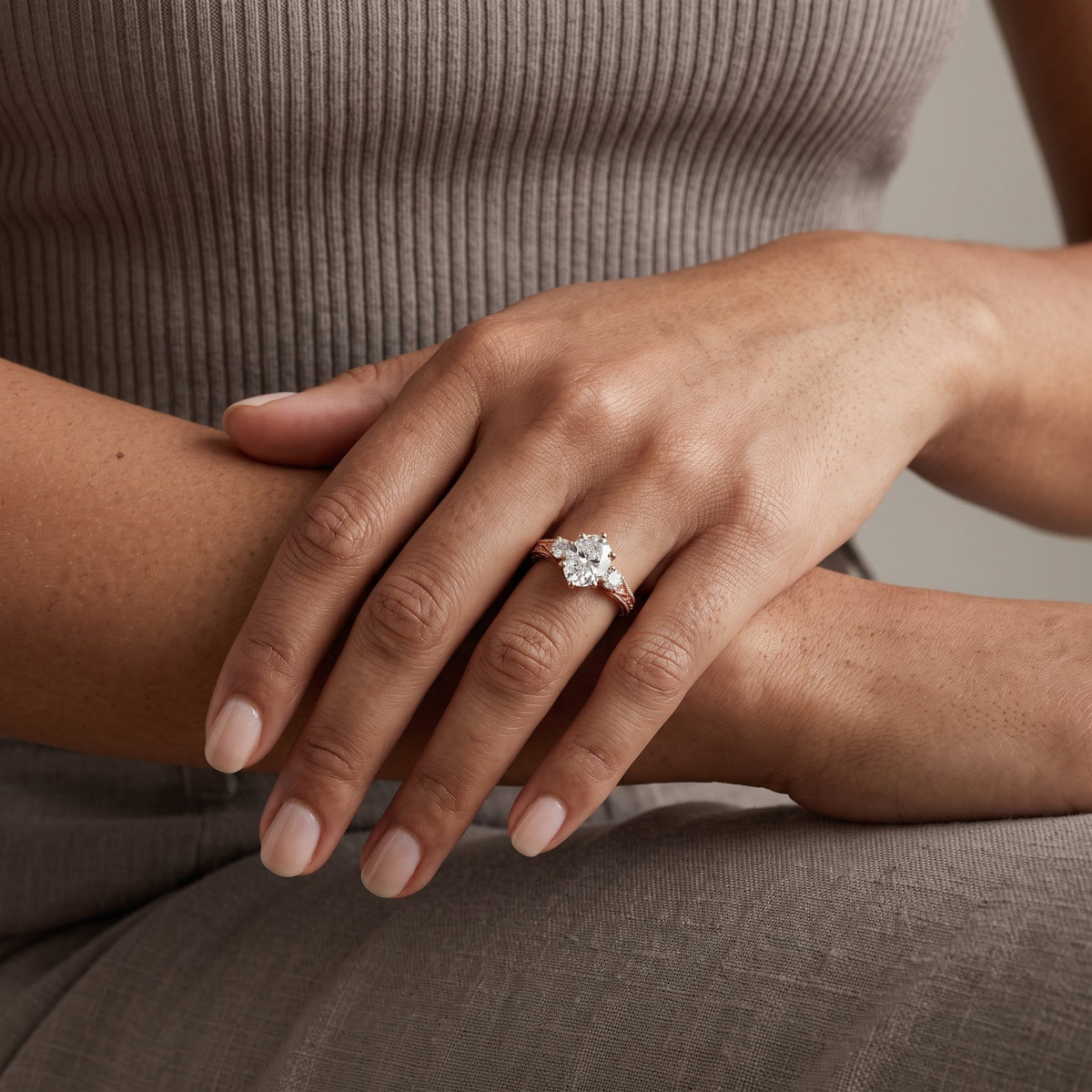 Rose Gold Oval Moissanite Engagement Ring with Side Stones