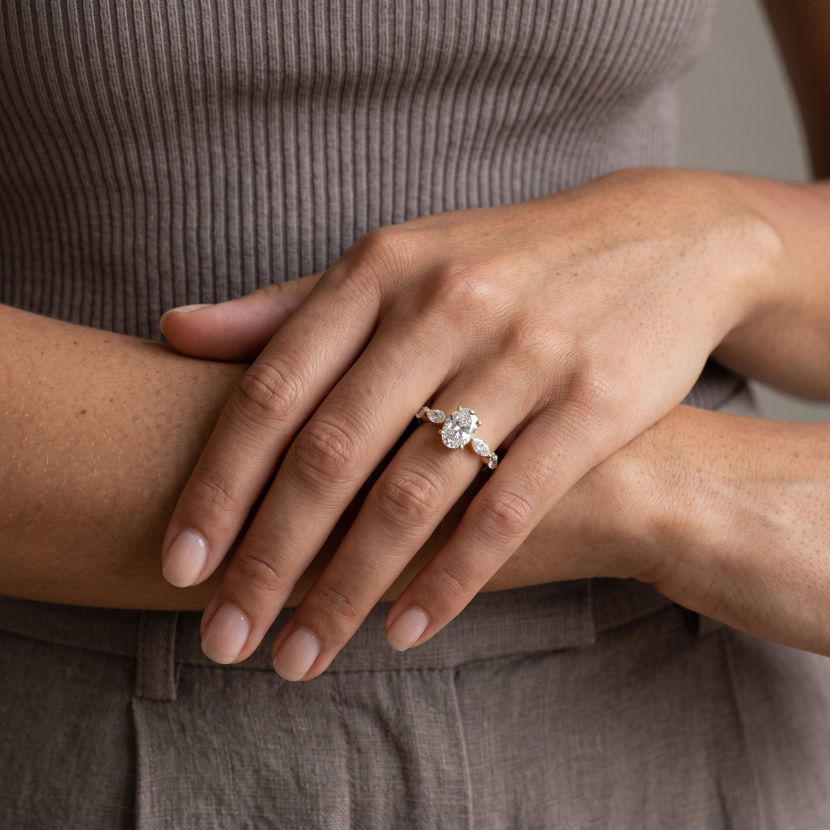 Yellow Gold Oval Moissanite Engagement Ring with Marquise Accents