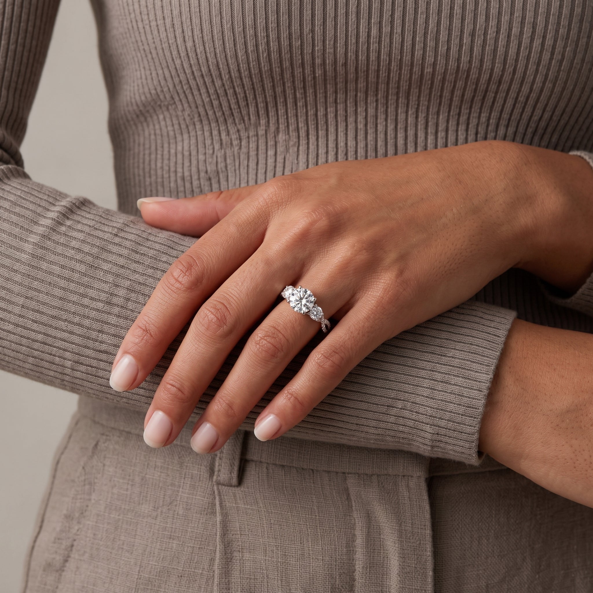White Metal Round Moissanite Three-Stone Engagement Ring