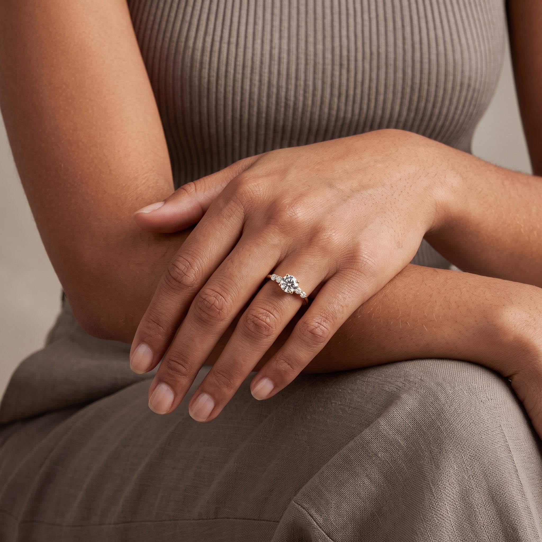 Yellow Gold Round Moissanite Engagement Ring with Side Stones