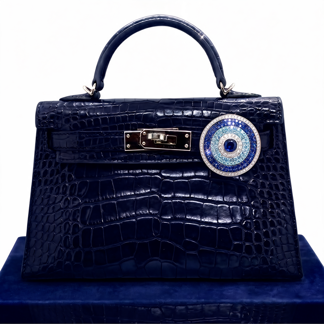Blue evil eye diamond bag charm in moissanite attached to a navy bag – Zius Jewels